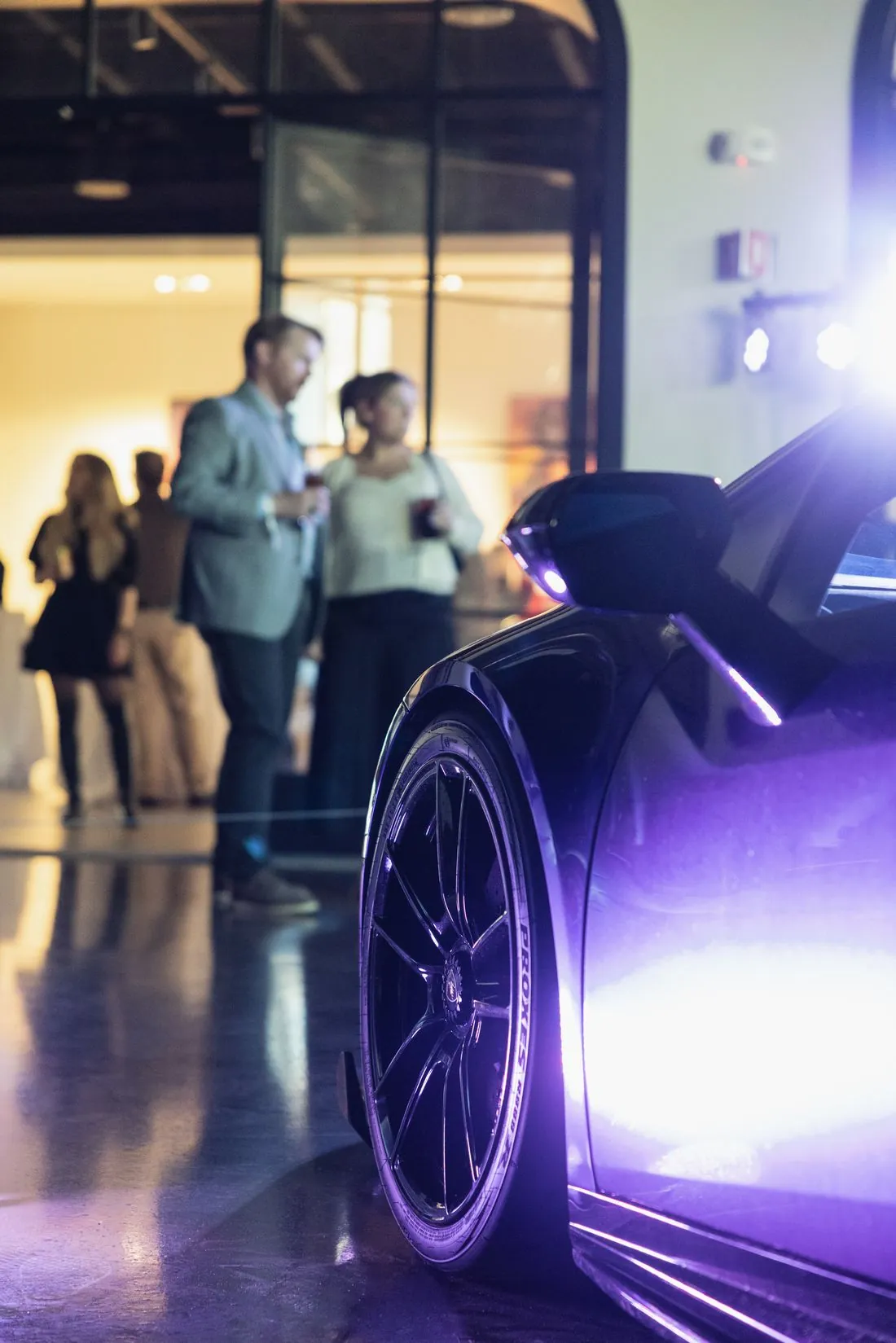 Guests among the collection at an Archive evening event