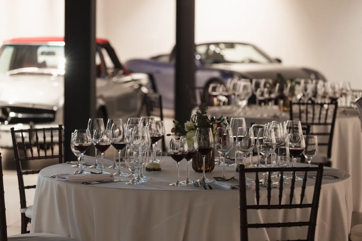Dinner tables set among the collection