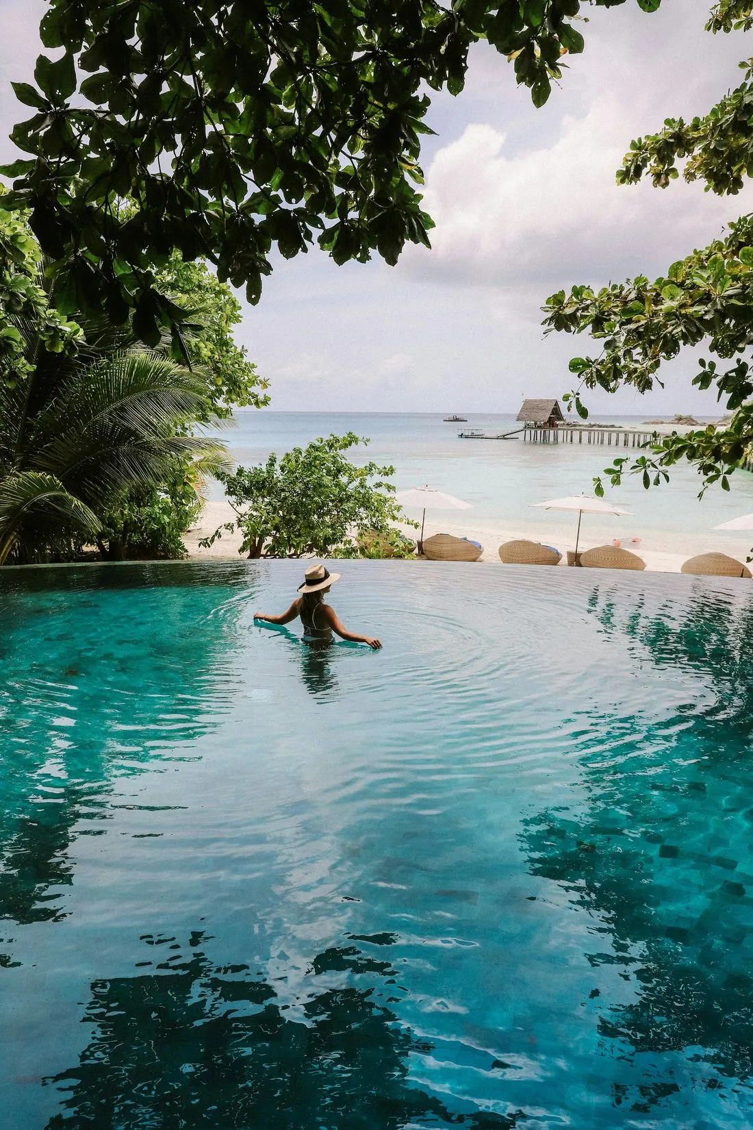 An infinity pool overlooking the water