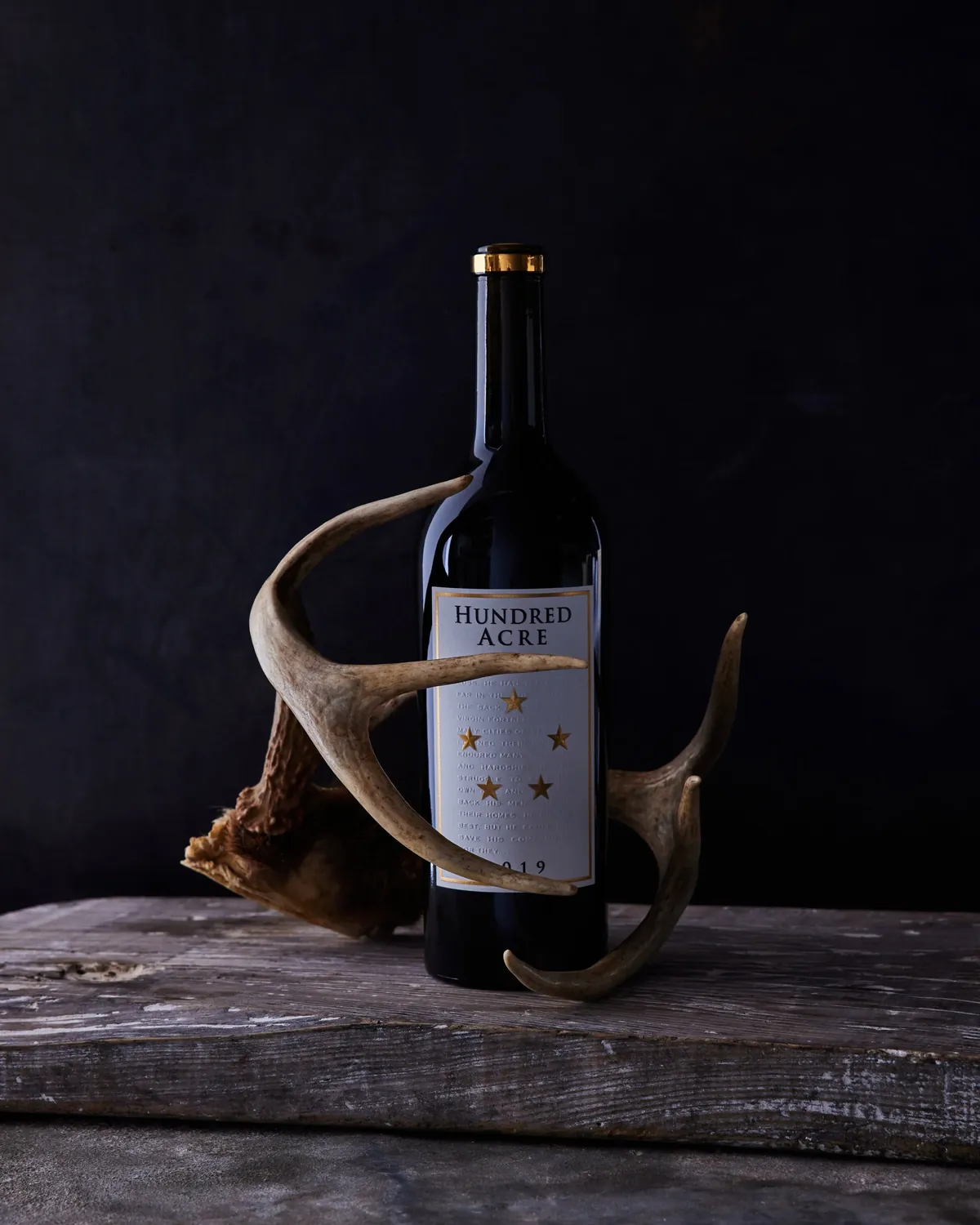 A collectible cabernet in a moody still life