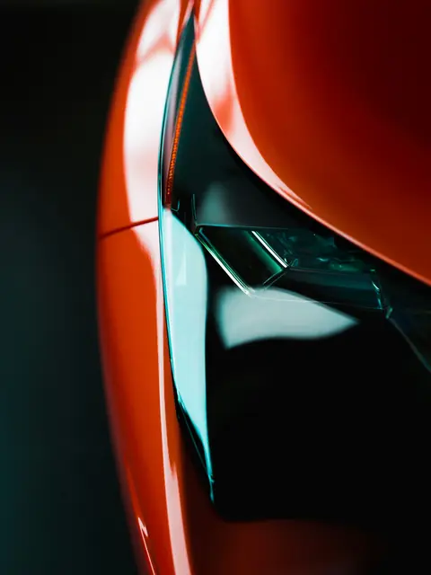 Sculpted bodywork in dramatic light
