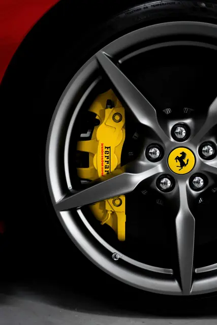 A forged wheel with a yellow brake caliper