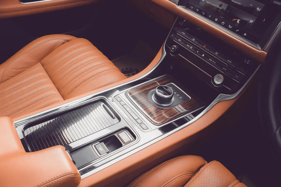 A machined center console in tan leather